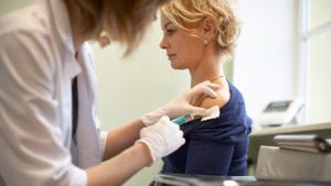 Woman receiving a Flu Shot
