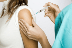 Woman receiving a flu shot